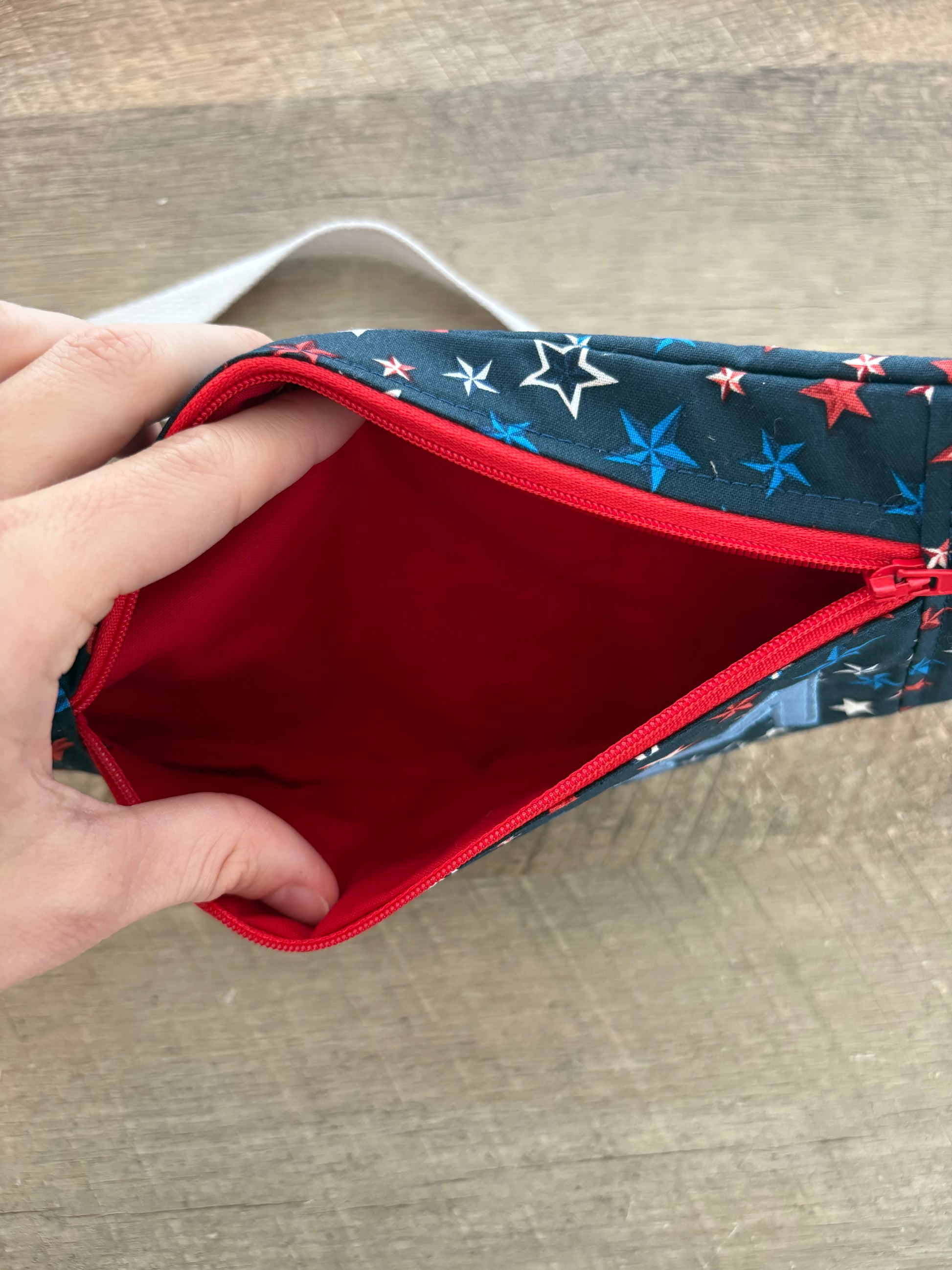 Inside of crossbody bag. 